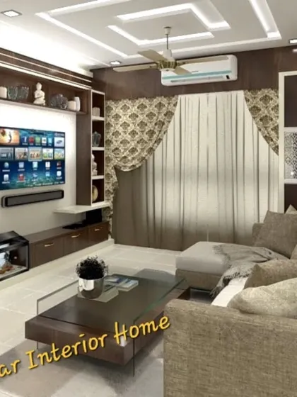 This living room features a large TV unit with ample display and storage space. The design incorporates a small aquarium, adding a unique and personal touch.