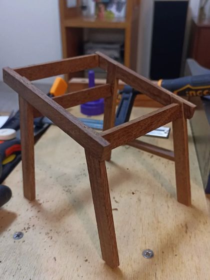 The fully assembled frame of the miniature chair model. This prototype helps confirm that all the angles and proportions are correct.