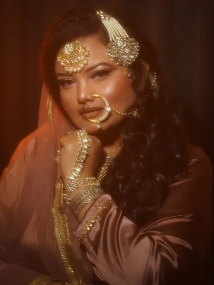 A full-frame shot showing the rich texture of the outfit and the regal feel of the overall look.
