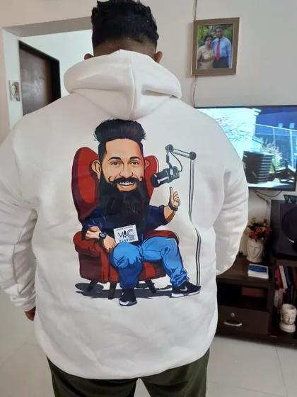 Your caricature isn't just for the wall. I can have your personalized artwork printed on high-quality apparel, like this custom hoodie, making it a truly unique and wearable piece of art.