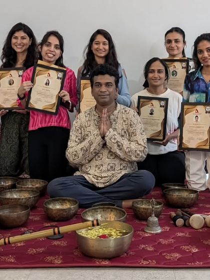 A group of newly certified sound healers proudly hold their certificates. It is an honor to guide these students as they become conduits for healing in their own communities.