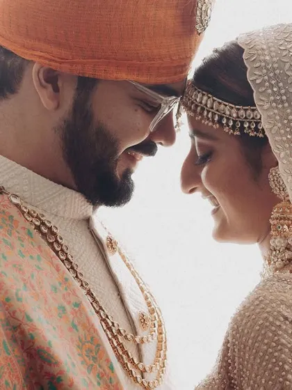A close-up, intimate portrait filled with warmth and affection. The way they lean into each other speaks volumes about their connection. This is the kind of quiet, powerful moment I love to capture.