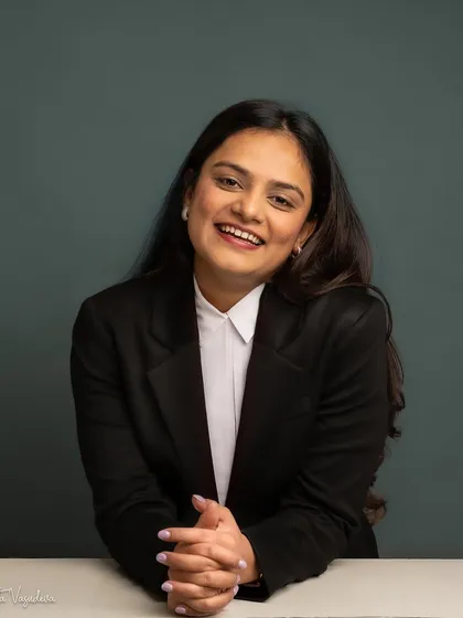 A smile is the most powerful tool in a professional portrait. This image of a lawyer captures her friendly and approachable nature, breaking the stereotype of a stuffy corporate headshot.