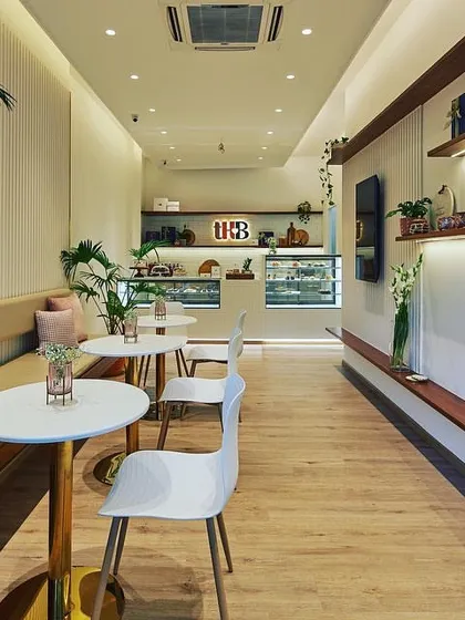 For The Home Bakery, we merged two distinct ideas: the baker's desire for a contemporary minimalist haven and the brand's warm, homely feel. The result is a welcoming space that feels both modern and deeply comforting.
