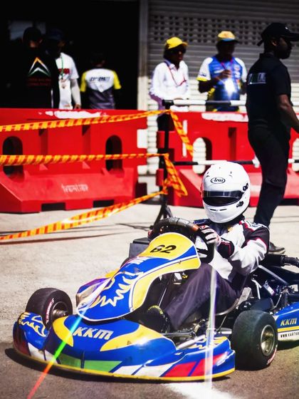 Our driver in the number 62 kart, waiting in the pit lane.