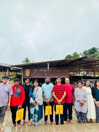 Another shot of our group at the Sigandur temple, holding prasadam bags.