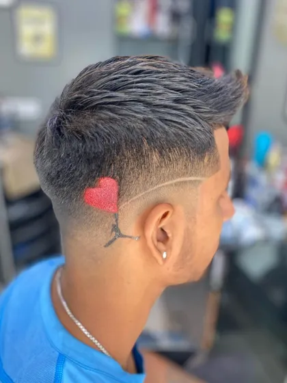 A creative combination of a hair tattoo and temporary airbrush color. I created a heart-shaped balloon design for a unique and playful style.