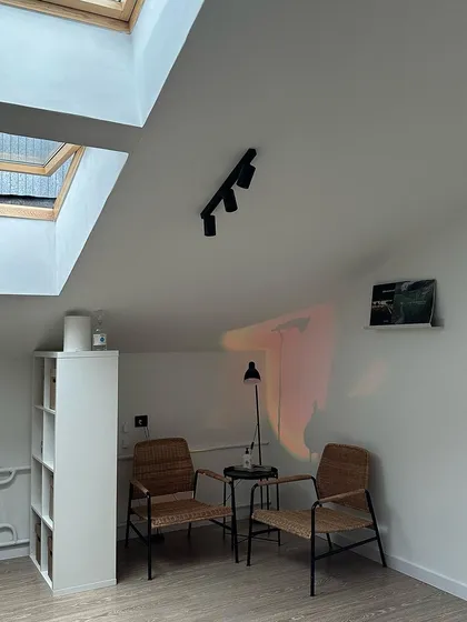 Welcome to our second home. I wanted to create a bright, airy, and peaceful space where you can feel completely at ease. The natural light from our skylights adds to the calm and cozy atmosphere of the studio.