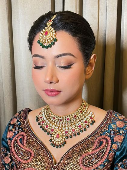 A close-up of Sumiya's makeup. You can see the precision of the winged liner and how the lip color brightens her entire face.