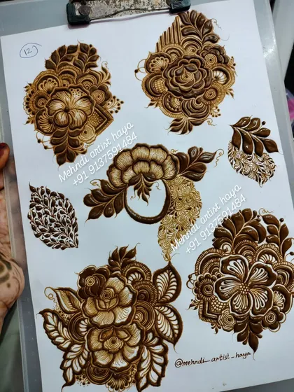 Another angle of the floral motif practice sheet. Notice the different styles, from a hibiscus-like flower to a classic rose, showing the variety of elements you will learn.