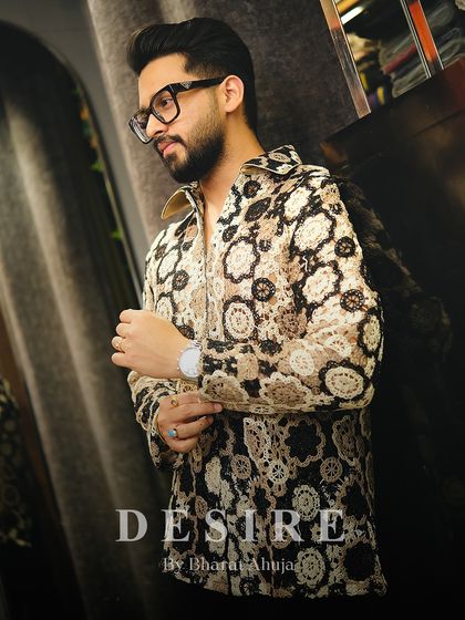 Step into any season with this designer shirt. Its unique texture and warm, earthy tones offer effortless style and standout appeal.