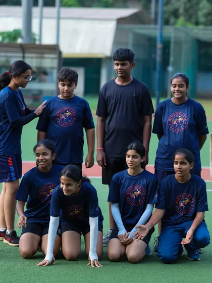 A candid moment as the U-14 team gets ready for a photo. It is these fun, unscripted moments that build team chemistry.