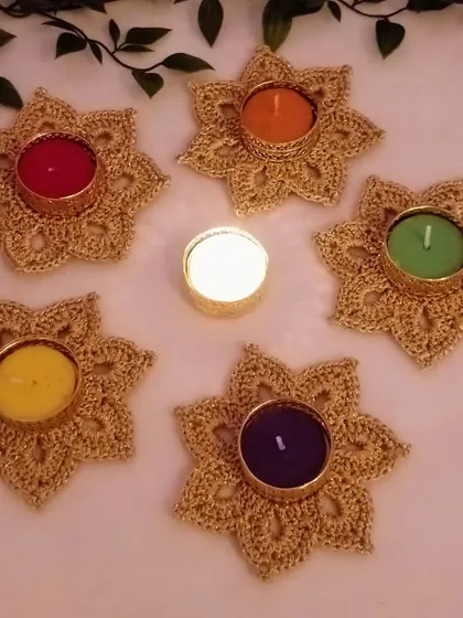 There is something special about the warm glow of a candle. These golden crochet tea light holders are designed to make those moments even more beautiful, especially during festivals like Diwali.