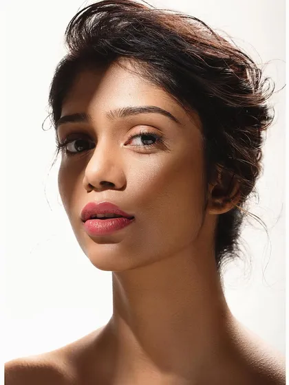 This shot demonstrates the power of shadow play. Using a single light source, I created a high-contrast look that sculpts the face and adds a layer of mystery. This is a great technique for creating more dramatic actor headshots.