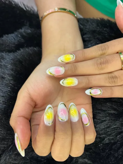 Another view of this sunny lemon-and-pink inspired set. The abstract watercolor effect is beautifully contained by the delicate gold chrome outline.