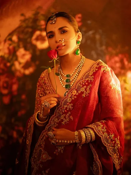 I love creating artistic and evocative portraits. This image uses warm, dramatic lighting and a rich, floral background to build a story. It’s a testament to my collaborative process with makeup artists and stylists to achieve a unique, painterly look.
