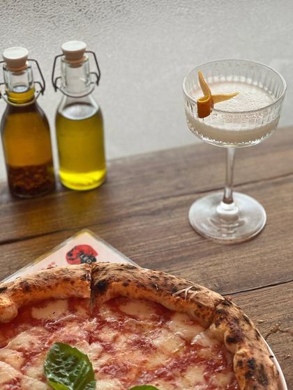 Life's too short for bad vibes or boring drinks. Luckily, we have neither. A classic pizza with a craft cocktail is always a good idea.
