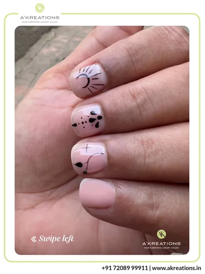 Our minimalist nail art focuses on clean lines and simple motifs, like this chic sun design, offering a modern and subtle way to express your style.