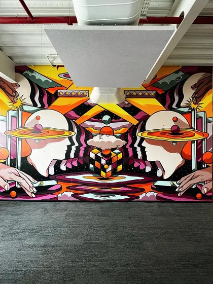 A full view of the large-scale mural I designed and executed for the Rippling office in Bangalore. This piece visualizes the concept of a "ripple effect," celebrating human-centric customer support through a surreal, cosmic landscape. I manage mural projects from the initial digital design to overseeing the on-site painting.
