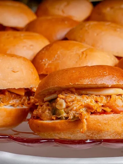 My delicious chicken sliders are a must-try. The juicy, flavorful chicken filling is packed into soft mini buns, creating the perfect bite.