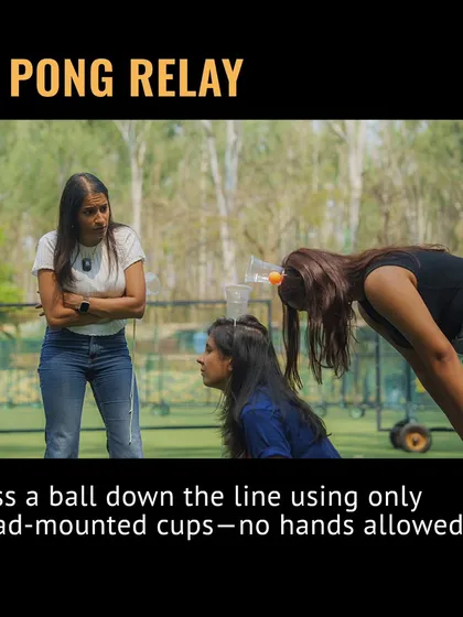 Welcome to Pong Relay. The challenge is to pass a ball down the line using only head-mounted cups. No hands allowed, lots of laughs guaranteed.
