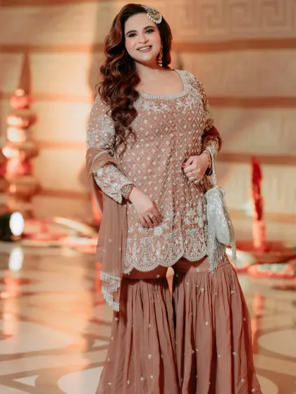 It's a joy to see a client's vision come to life. I loved styling my friend for her nephew's Namkaran ceremony in this beautiful sharara set, ensuring she felt comfortable, confident, and perfectly dressed for the occasion.