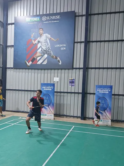 Players engaged in a rally during the demo day. It's a great chance for them to play with different partners and experience a friendly, competitive environment.