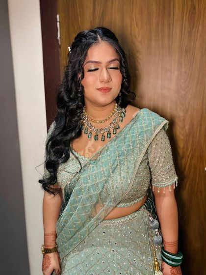 A close-up of the client, her makeup looking flawless.