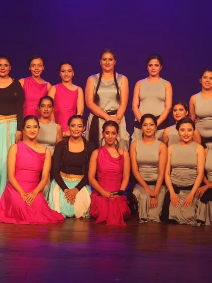 A group photo of our performers on stage, a testament to the teamwork and dedication that goes into every show.