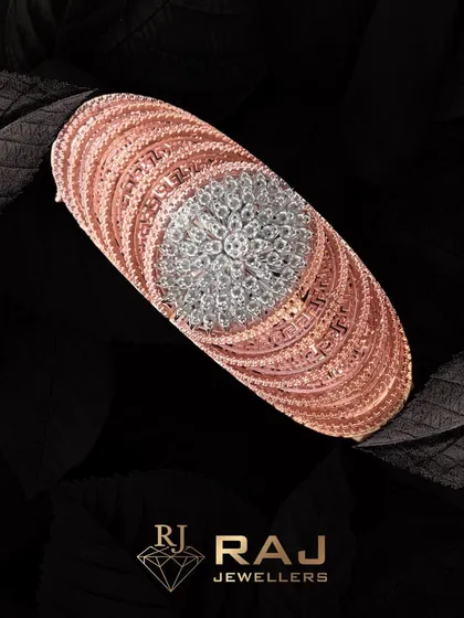 A testament to modern luxury, this rose gold bracelet features a stunning centerpiece of clustered CZ stones, creating a brilliant floral effect. The intricate design and warm tones make it a sophisticated statement of style.