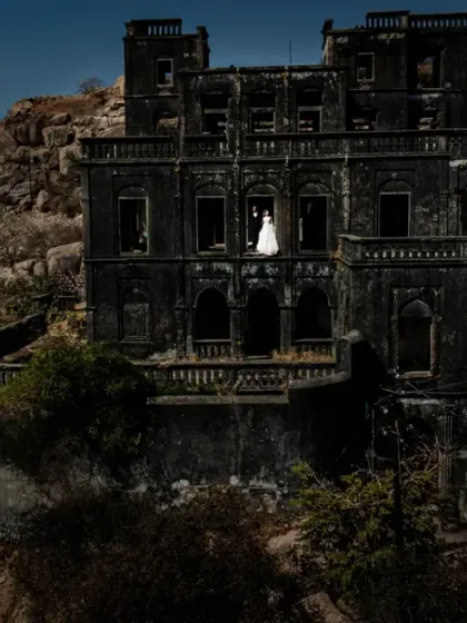 For me, it's about finding the perfect harmony between a couple and a grand landscape. This portrait, shot at the ruins of a forgotten palace in Gujarat, shows how we can create a sense of timelessness and scale, making your story feel truly epic.