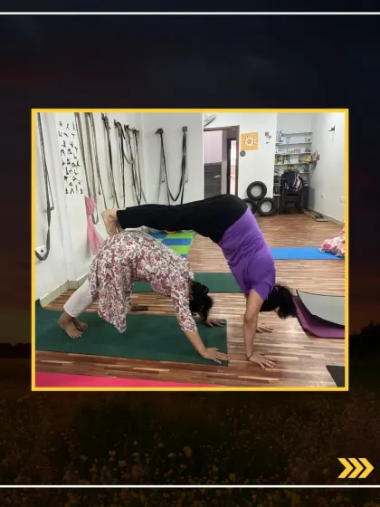 This partner pose combines downward dog with a plank, creating a dynamic challenge for both strength and flexibility.