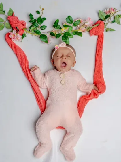 Swinging into a world of dreams. I use simple, safe props like this floral swing to create artistic and imaginative portraits of your sleeping baby.