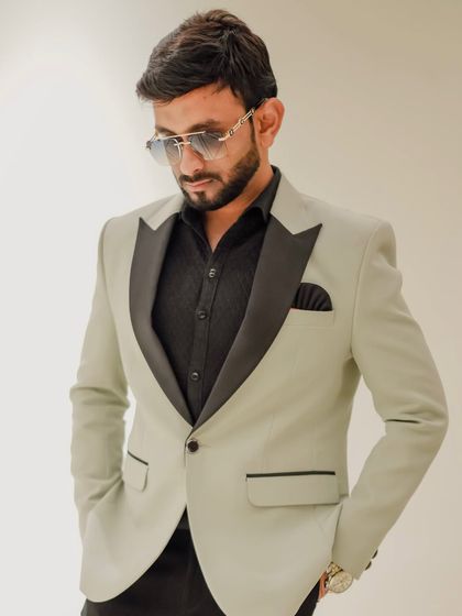 A posed shot capturing the sleek silhouette of my formal attire. My goal is to always present a polished and sophisticated image on behalf of my clients.