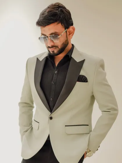 A posed shot capturing the sleek silhouette of my formal attire. My goal is to always present a polished and sophisticated image on behalf of my clients.