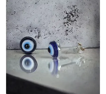 These simple evil eye stud earrings are perfect for daily protection and style. The classic blue and white design is set in pure 92.5 silver.
