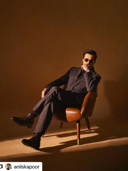 A classic portrait pose, where the hair plays a key role in framing the face.
