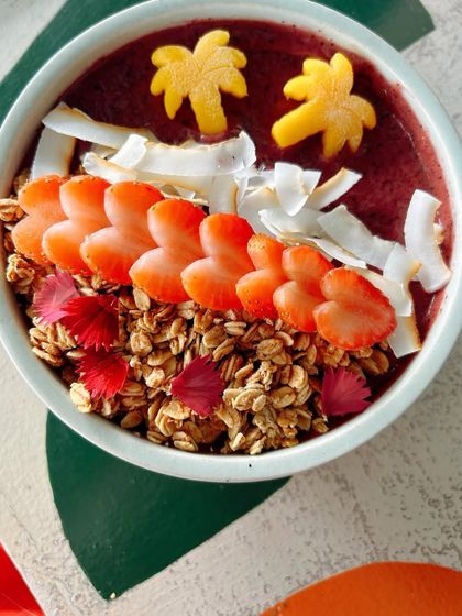 A beautifully crafted açai bowl. Even a simple, healthy breakfast can be turned into stunning content with the right focus on color, texture, and presentation.