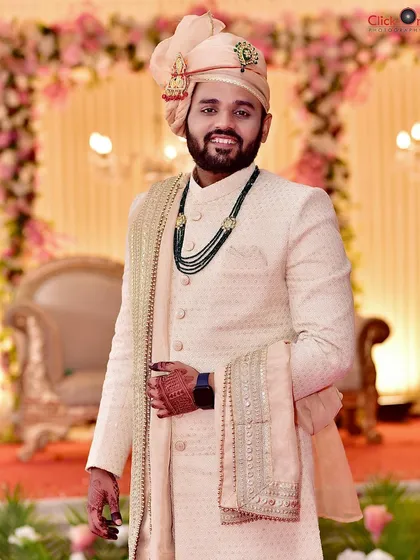 A sharp and elegant portrait of the groom in his wedding sherwani. We ensure the groom's style and personality are captured with the same attention to detail as the bride's.