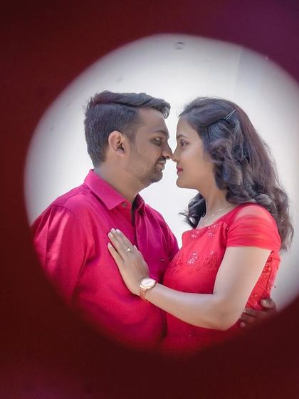 I love experimenting with creative framing. This shot, taken through an object, creates a unique and intimate peephole view of the couple.