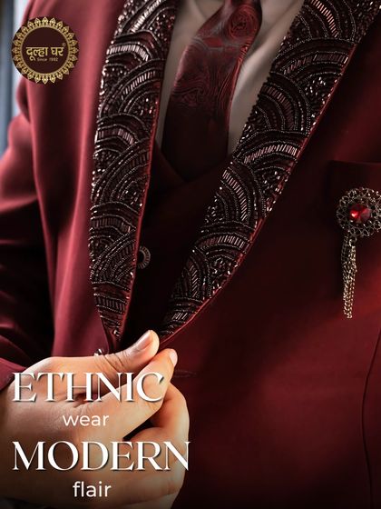Ethnic wear, modern flair. A close-up of a maroon suit's embellished lapel, a perfect fusion of tradition and contemporary design.