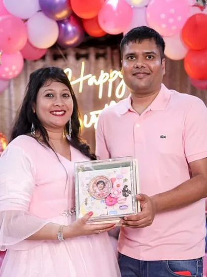 Nothing warms my heart more than seeing this lovely couple adore the special album made for their little princess. Their smiles say it all!