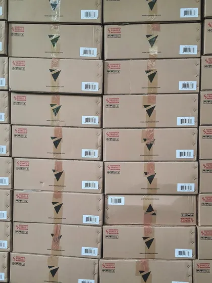 A wall of boxes containing a new shipment of Creamsource Vortex 8 lights. We are constantly investing in our inventory to meet the growing demands of large-scale productions.