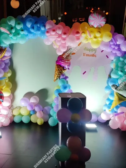 A sweet Candyland theme party with donut, ice cream, and candy foil balloons.