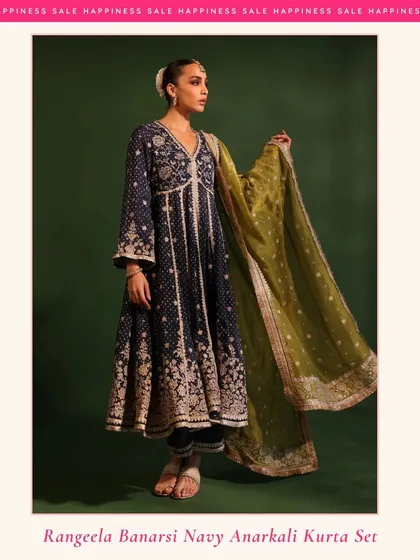 This is elegance, bottled. My Rangeela Banarsi Navy Anarkali is for when you want to make an entrance. The rich navy blue fabric paired with the contrasting olive green organza dupatta is perfect for a wedding reception or a formal evening event.