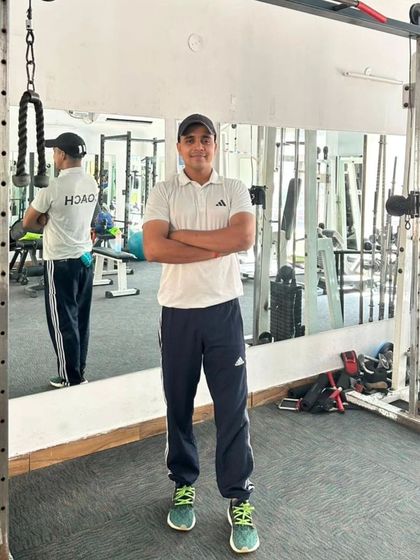 Proud to be a coach. This t-shirt says it all. I am ready to guide you on your fitness journey at my academy in Noida Sector 99.