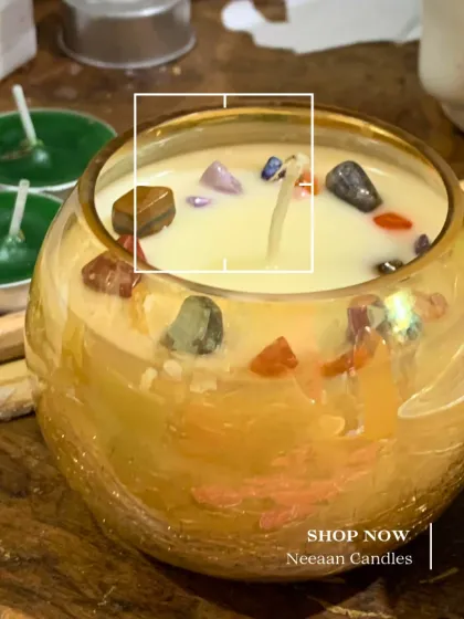 Light up your space with magic and meaning. This beautiful amber glass bowl candle is infused with a variety of healing crystals to radiate positive energy.