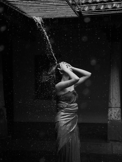 A dramatic black and white shot from a shoot that involved water. I'm not afraid to get adventurous for the perfect shot, whether it involves rain, water, or challenging environments.