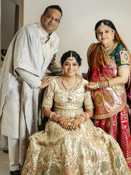 These heartwarming photos show the bride with her parents. I created coordinated, elegant makeup and hair for both the bride and her mother, ensuring everyone felt their best on this special family day.