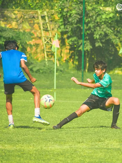 A GSC player dribbles past an opponent during a Pride Cup match.